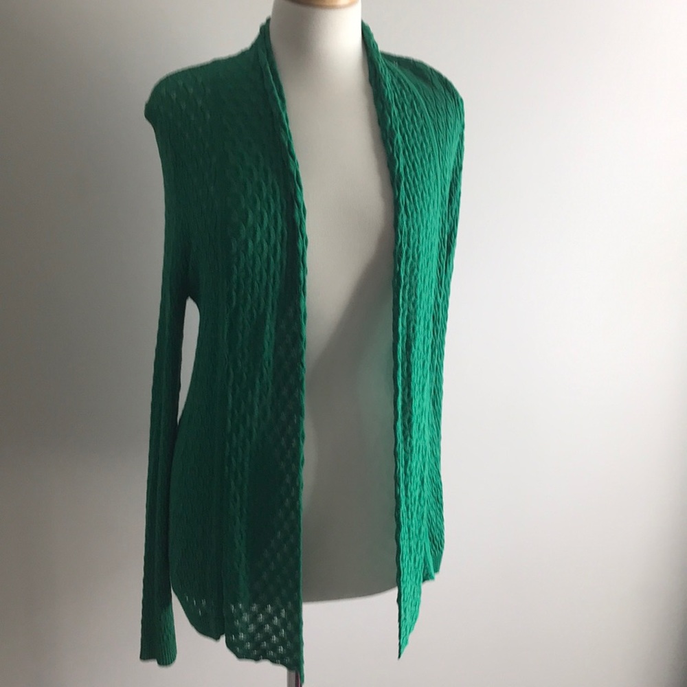 A. Green color cardigan